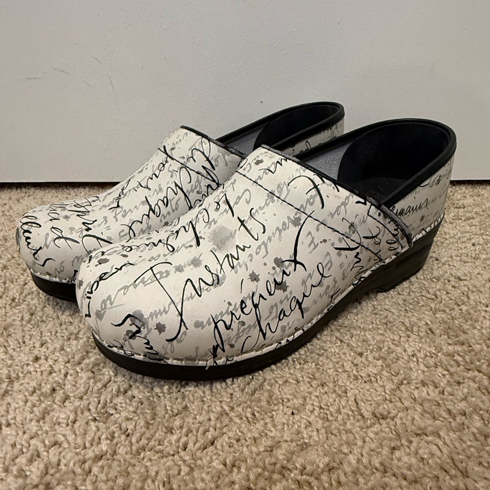 Dansko White and Black Script Mules